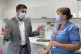 Humza Yousaf talks with registered Nurse Laura Hastings at V