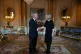 Charles shakes hands with Prime Minister Liz Truss during th