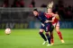 Arsenal's Beth Mead (right) and Ajax's Sherida Spitse battle