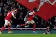 Arsenal's Bukayo Saka (right) celebrates scoring their side'