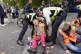 Police officers detain a Just Stop Oil protester outside New