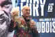 Tyson Fury holding £10,000 in cash after winning a bet with
