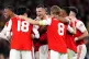 Arsenal's Granit Xhaka (centre) celebrates with team-mates a