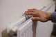 A hand on a radiator