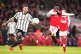 Juventus' Alessandro Riccio (left) and Arsenal's Reiss Nelso