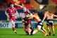 Scarlets' Jonathan Davies is tackled by Toyota Cheetahs' Ryn