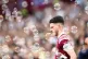 West Ham United's Declan Rice walks out as bubbles fly aroun