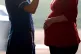 A midwife talking to a pregnant woman