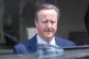 Former prime minister David Cameron leaving after giving evi
