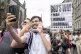 People take part in the Pride Edinburgh 2023 parade through 