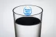 The logo of water company Thames Water seen through a glass 