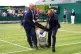A Just Stop Oil protester is carried off court 18 after thro