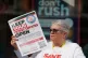 An RMT member campaigning against ticket office closures