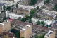 An aerial view of terraced housing and blocks of flats in we