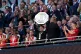 Arsenal manager Mikel Arteta and team lift the trophy after 
