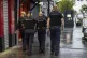 Immigration enforcement officers take part in an immigration