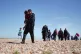 A group of people are brought in to Dungeness, Kent, onboard