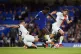 uton Town's Ross Barkley tackles Chelsea�s Nicolas Jackson