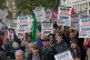 People take part in a protest organised by the Rail, Maritim