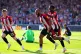 Brentford's Bryan Mbeumo (centre) celebrates scoring their s