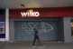 A man walks past the closed Wilko store in Barking, east Lon
