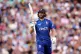 England's Chris Woakes walks off the pitch after losing his 