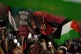 People take part in a Palestine Solidarity Campaign demonstr
