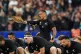 New Zealand's Aaron Smith leads his teammates as they perfor