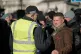 Far-right leader Tommy Robinson speaks to police officers as