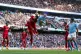 Liverpool's Wataru Endo battles with Manchester City's Erlin