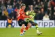 INTENSE GAME: Arsenal's Bukayo Saka (right) and Luton Town's