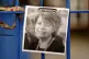 A photograph of Ruth Perry attached to the fence outside Joh