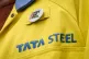 A steelworker wearing a badge on his jacket outside the UK's
