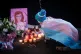 Tributes left during a vigil in Golden Square, Warrington, t