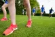 Students running during a Physical Education (PE) lesson on 