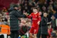Liverpool's Lewis Koumas and manager Jurgen Klopp during the