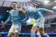 Manchester City's Erling Haaland (right) celebrates scoring 