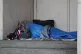 A homeless person sleeping rough in a doorway, February 7, 2