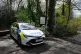 A police car parked at the entrance to Kersal Dale, near Sal