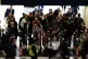 Passengers arrive at Waterloo train station in London, April