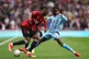 Manchester United's Aaron Wan-Bissaka (left) and Coventry Ci