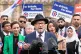George Galloway speaking to the media during a press confere