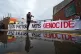 Protesters form a blockade outside weapons manufacturer BAE 