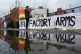 Protesters form a blockade outside weapons manufacturer BAE 
