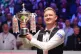 Kyren Wilson celebrates with the trophy after winning the fi