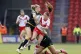 Saint Helens' Tara Jones is tackled during the Women's Chall