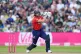 England's Jos Buttler watches his shot as he's caught out by