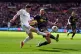 Leeds United's Daniel James (left) attempts to cross the pla