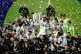Real Madrid's Aurelien Tchouameni celebrates with the trophy