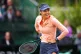Emma Raducanu reacts to a line call in her match against Dar